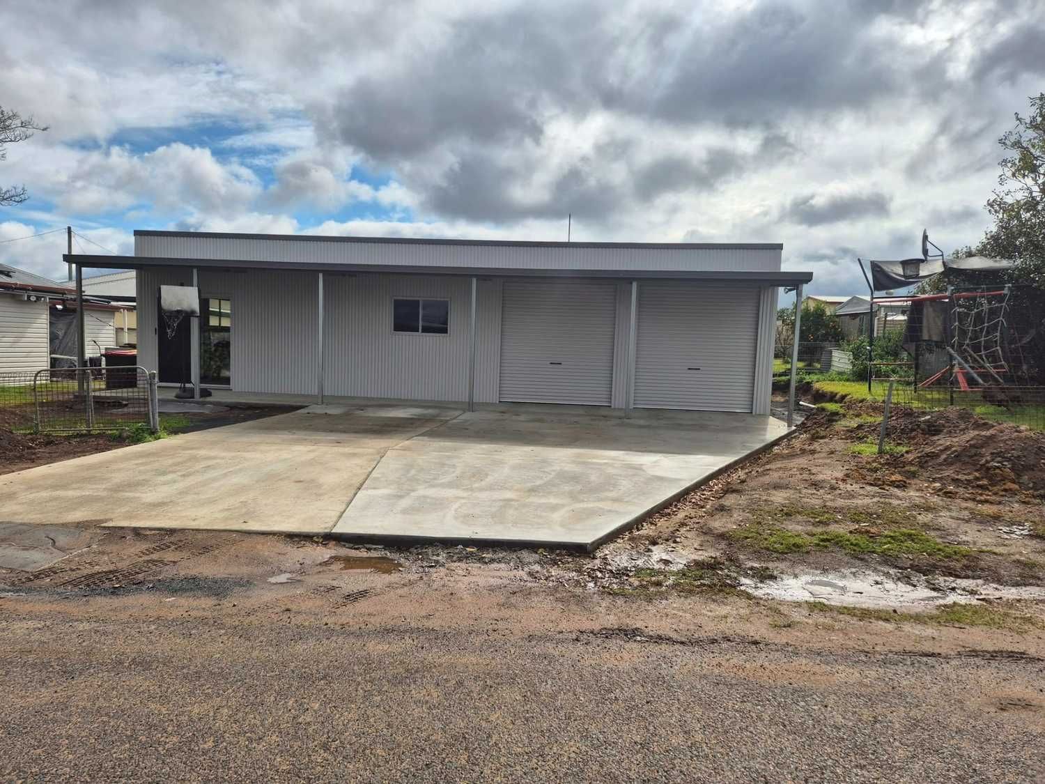 Open carport on concrete slab